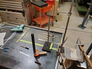 The setup for a tube forming system where the rod vertically mounted a second 3/16 x 5 inch on a mobile stand.